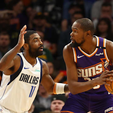 Kevin Durant guarded by Kyrie Irving during a December matchup between the Mavericks and Suns.