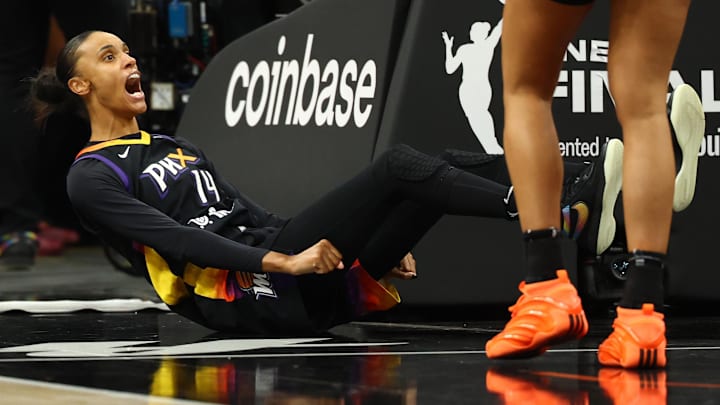 Oct 8, 2025; Phoenix, Arizona, USA; Phoenix Mercury forward DeWanna Bonner (14) reacts after a basket against the Las Vegas Aces in the second half during game three of the 2025 WNBA Finals at PHX Arena. Mandatory Credit: Mark J. Rebilas-Imagn Images