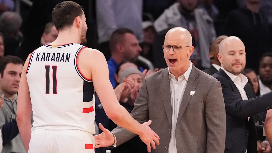 Mar 13, 2025; New York, NY, USA;  Connecticut Huskies head coach Dan Hurley greets Connecticut Huskies forward Alex Karaban (11) after he left the game late in the 2nd half against the Villanova Wildcats at Madison Square Garden. Mandatory Credit: Robert Deutsch-Imagn Images