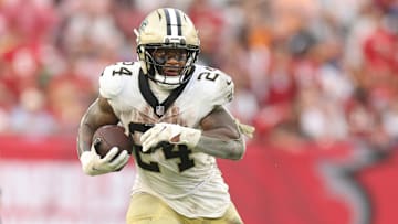 Dec 7, 2025; Tampa, Florida, USA; New Orleans Saints running back Devin Neal (24) runs for a gain during the fourth quarter against the Tampa Bay Buccaneers at Raymond James Stadium. Mandatory Credit: Nathan Ray Seebeck-Imagn Images