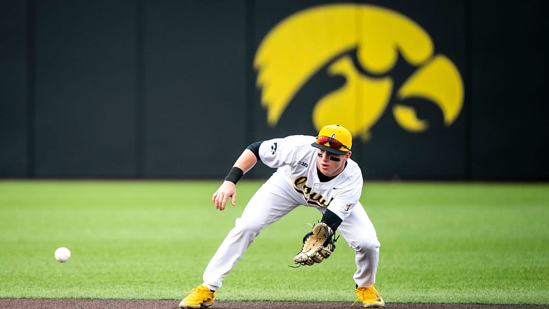 Iowa's Gable Mitchell fields a ball during a NCAA baseball game against Loras College, Tuesday, Feb. 28, 2023, at Duane Banks Field in Iowa City, Iowa.

230228 Loras Iowa Bsb 015 Jpg
