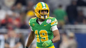Jan 1, 2024; Glendale, AZ, USA; Oregon Ducks defensive back Tyler Turner (19) against the Liberty Flames during the 2024 Fiesta Bowl at State Farm Stadium.
