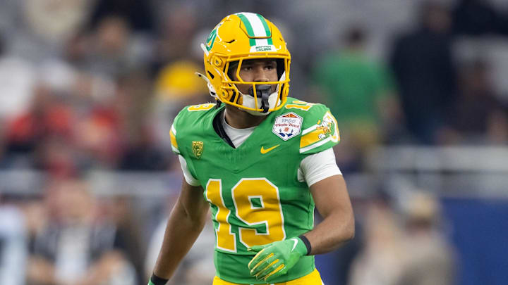 Jan 1, 2024; Glendale, AZ, USA; Oregon Ducks defensive back Tyler Turner (19) against the Liberty Flames during the 2024 Fiesta Bowl at State Farm Stadium.