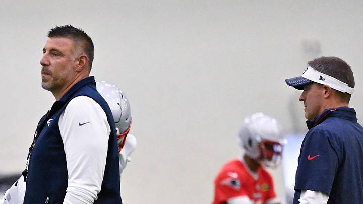 Jun 10, 2025; Foxborough, MA, USA; New England Patriots head coach Mike Vrabel (center) and offensive coordinator Josh McDaniels (r) work with center Garrett Bradbury (65), offensive tackle Mike Onwenu (71) and offensive tackle Morgan Moses (76) during minicamp held in the WIN Field House at Gillette Stadium. Mandatory Credit: Eric Canha-Imagn Images