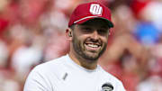 Apr 23, 2022; Norman, Oklahoma, USA;  Oklahoma Sooners former player Baker Mayfield speaks to the crowd as his statue is unveiled during the spring game at Gaylord Family Oklahoma Memorial Stadium. Mandatory Credit: Kevin Jairaj-Imagn Images