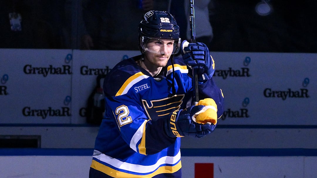 Nov 3, 2025; St. Louis, Missouri, USA; St. Louis Blues center Pius Suter (22) salutes the fans after he was named second star of the game in a victory over the Edmonton Oilers at Enterprise Center. Mandatory Credit: Jeff Curry-Imagn Images