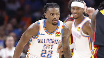 Oct 27, 2024; Oklahoma City, Oklahoma, USA; Oklahoma City Thunder guard Cason Wallace (22) defends Atlanta Hawks guard Keaton Wallace (2) during the second half at Paycom Center. Mandatory Credit: Alonzo Adams-Imagn Images