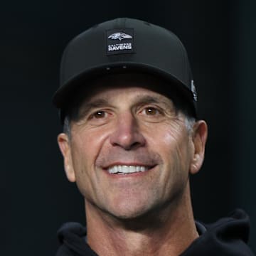 Baltimore Ravens head coach John Harbaugh stands on the sidelines prior to a game against the Miami Dolphins.
