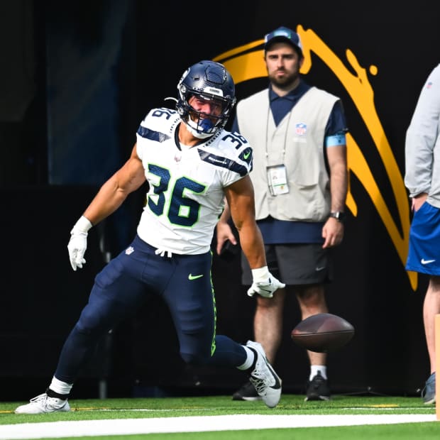 Seattle Seahawks running back George Holani (36) makes a touchdown against the Los Angeles Chargers.