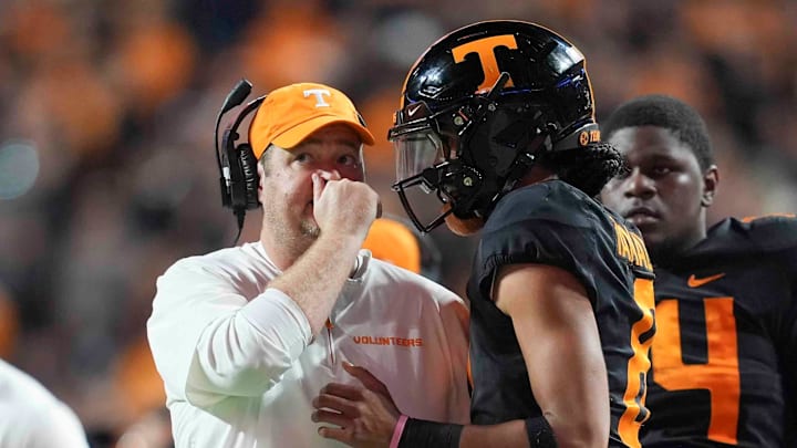 Tennessee head coach Josh Heupel talks to Tennessee quarterback Nico Iamaleava (8) on the sideline during a game between Tennessee and Kentucky at Neyland Stadium in Knoxville, Tenn., Saturday, Nov. 2, 2024.