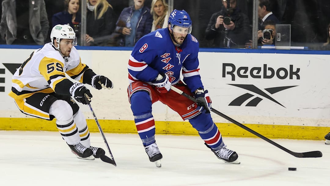 Feb 28, 2026; New York, New York, USA; Pittsburgh Penguins right wing Egor Chinakhov (59) and New York Rangers center J.T. Miller (8) battle for control of the puck in overtime at Madison Square Garden. Mandatory Credit: Wendell Cruz-Imagn Images Feb 28, 2026; New York, New York, USA; Pittsburgh Penguins right wing Egor Chinakhov (59) and New York Rangers center J.T. Miller (8) battle for control of the puck in overtime at Madison Square Garden. Mandatory Credit: Wendell Cruz-Imagn Images