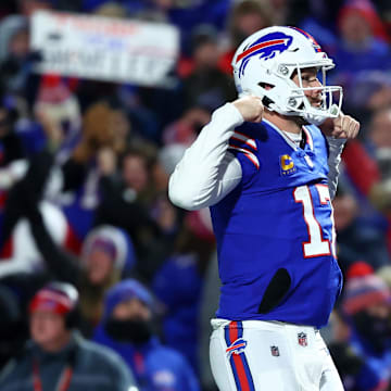 Jan 21, 2024; Orchard Park, New York, USA; Buffalo Bills quarterback Josh Allen (17) reacts after a touchdown against the Kansas City Chiefs during the first half for the 2024 AFC divisional round game at Highmark Stadium. Mandatory Credit: Mark J. Rebilas-Imagn Images