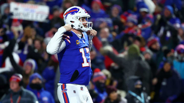 Jan 21, 2024; Orchard Park, New York, USA; Buffalo Bills quarterback Josh Allen (17) reacts after a touchdown against the Kansas City Chiefs during the first half for the 2024 AFC divisional round game at Highmark Stadium. Mandatory Credit: Mark J. Rebilas-USA TODAY Sports