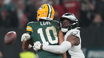 Sep 6, 2024; Sao Paulo, BRA; Green Bay Packers quarterback Jordan Love (10) is pressured by Philadelphia Eagles defensive tackle Jalen Carter (98) and linebacker Josh Sweat (19) during the second half at Neo Quimica Arena. Mandatory Credit: Kirby Lee-Imagn Images