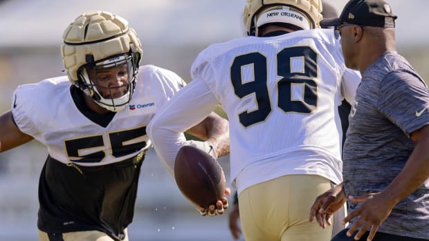 New Orleans Saints defensive ends Isaiah Foskey and Payton Turner (98) during training camp drills 