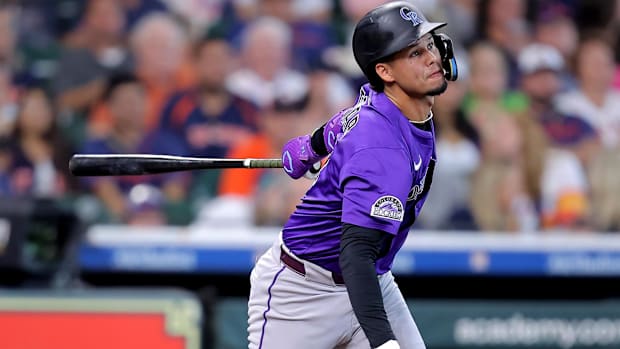 Ezequiel Tovar after hitting the ball about to run the bases