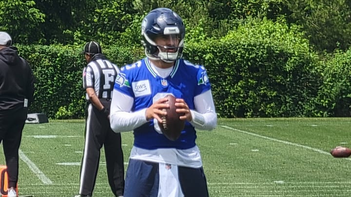 Quarterback Sam Howell prepares for a drill during the Seahawks fifth OTA practice at the VMAC.