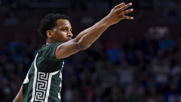 Mar 20, 2022; Greenville, SC, USA; Michigan State Spartans forward Marcus Bingham Jr. (30) reacts to making a three-point basket against the Duke Blue Devils in the first half during the second round of the 2022 NCAA Tournament at Bon Secours Wellness Arena. Mandatory Credit: Bob Donnan-USA TODAY Sports