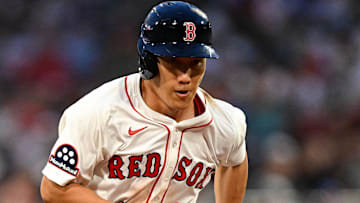  Boston Red Sox designated hitter Masataka Yoshida (7) runs to third base during the fourth inning of a game against the Colorado Rockies at Fenway Park.