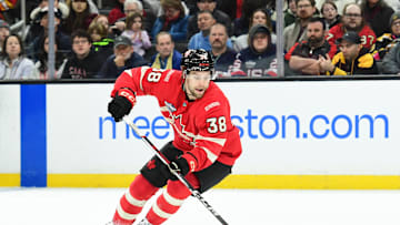 Feb 17, 2025; Boston, MA, USA; [Imagn Images direct customers only]  Team Canada forward Brandon Hagel (38) controls the puck during the first period in a 4 Nations Face-Off ice hockey game against Team Finland at TD Garden. Mandatory Credit: Bob DeChiara-Imagn Images