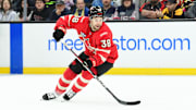 Feb 17, 2025; Boston, MA, USA; [Imagn Images direct customers only]  Team Canada forward Brandon Hagel (38) controls the puck during the first period in a 4 Nations Face-Off ice hockey game against Team Finland at TD Garden. Mandatory Credit: Bob DeChiara-Imagn Images