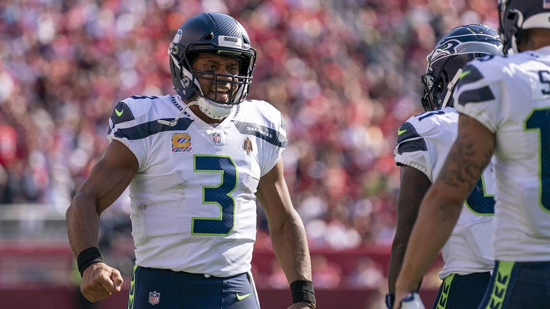 October 3, 2021; Santa Clara, California, USA; Seattle Seahawks quarterback Russell Wilson (3) celebrates with wide receiver Freddie Swain (18) after a touchdown against the San Francisco 49ers during the third quarter at Levi's Stadium.