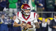 Oct 18, 2025; South Bend, Indiana, USA;  Southern California Trojans quarterback Jayden Maiava (14) drops back to throw the ball in the first half against the Notre Dame Fighting Irish at Notre Dame Stadium. Mandatory Credit: Trevor Ruszkowski-Imagn Images