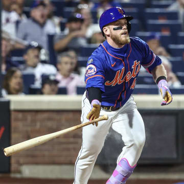 Jun 26, 2024; New York City, New York, USA;  New York Mets center fielder Harrison Bader (44) hits an RBI double in the fifth inning against the New York Yankees at Citi Field. Mandatory Credit: Wendell Cruz-USA TODAY Sports