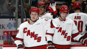 Former Carolina Hurricanes winger Jake Guentzel waves to the crowd. 