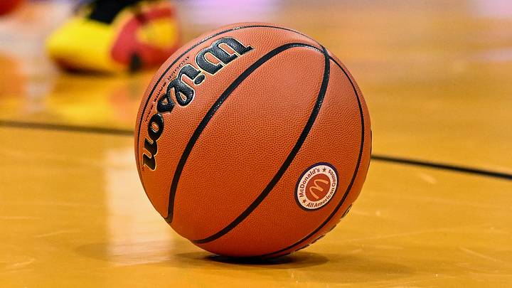 Apr 2, 2024; Houston, TX, USA; A detailed view of the McDonald's All American logo on a basketball during the game between the McDonald's All American East and the McDonald's All American West at Toyota Center. Mandatory Credit: Maria Lysaker-Imagn Images