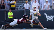 Oct 11, 2025; Atlanta, Ga.; Georgia Tech quarterback Haynes King (10) runs the ball against Virginia Tech.