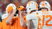Tennessee coach Josh Heupel talks with Tennessee quarterback Joey Aguilar (6) during a college football game between Tennessee and Alabama at Bryant-Denny Stadium in Tuscaloosa, Ala., on Oct. 18, 2025.