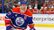 Mar 4, 2025; Edmonton, Alberta, CAN; Edmonton Oilers forward Connor McDavid (97) looks for a loose puck against the Anaheim Ducks at Rogers Place. Mandatory Credit: Perry Nelson-Imagn Images