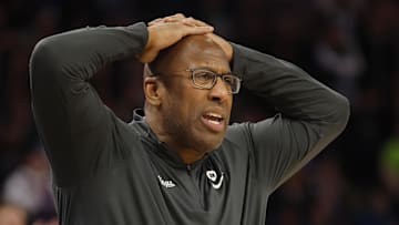Mar 1, 2024; Minneapolis, Minnesota, USA; Sacramento Kings head coach Mike Brown reacts in disbelief to a referee's call for the Minnesota Timberwolves in overtime at Target Center. Mandatory Credit: Bruce Kluckhohn-Imagn Images