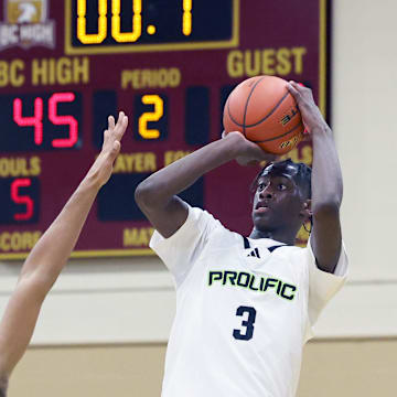 Prolific Prep's AJ Dybantsa takes a half court shot at the basket during a game on Orangeville Prep on Wednesday, Jan. 10, 2024.