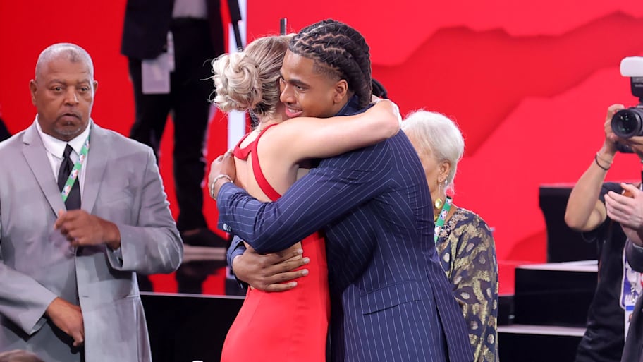 Collin Murray-Boyles embraces girlfriend Chloe Kitts after being selected as the No. 9 pick in the 2025 NBA draft by the Toronto Raptors. | Brad Penner-Imagn Images