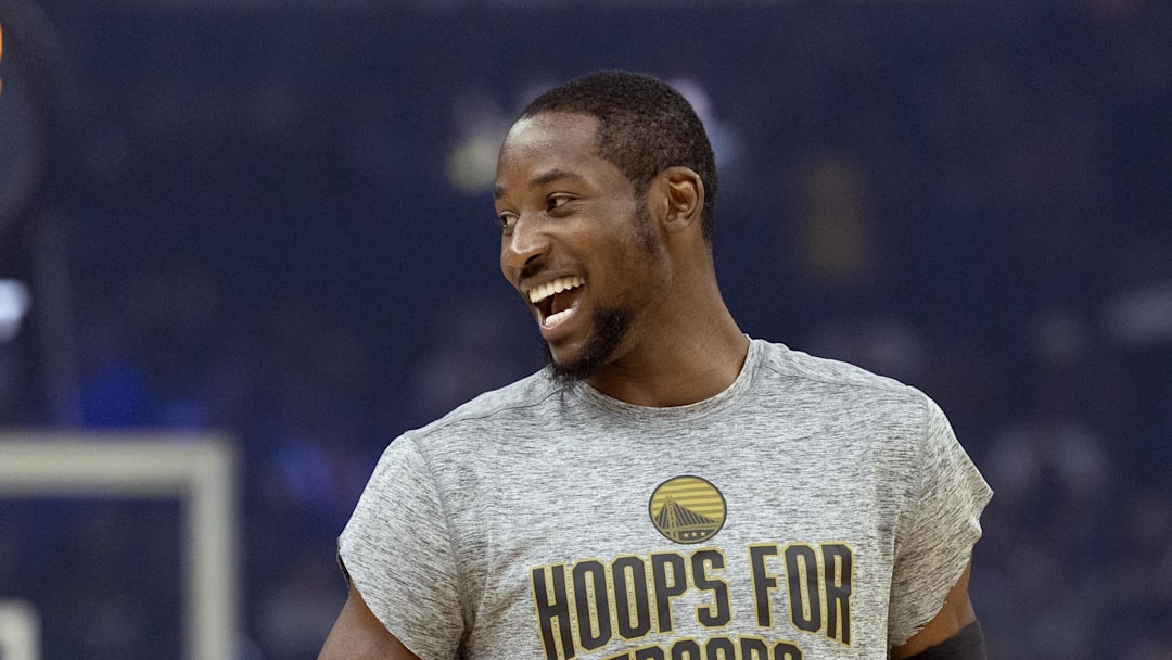 Jonathan Kuminga warms up before facing the Indiana Pacers at Chase Center.