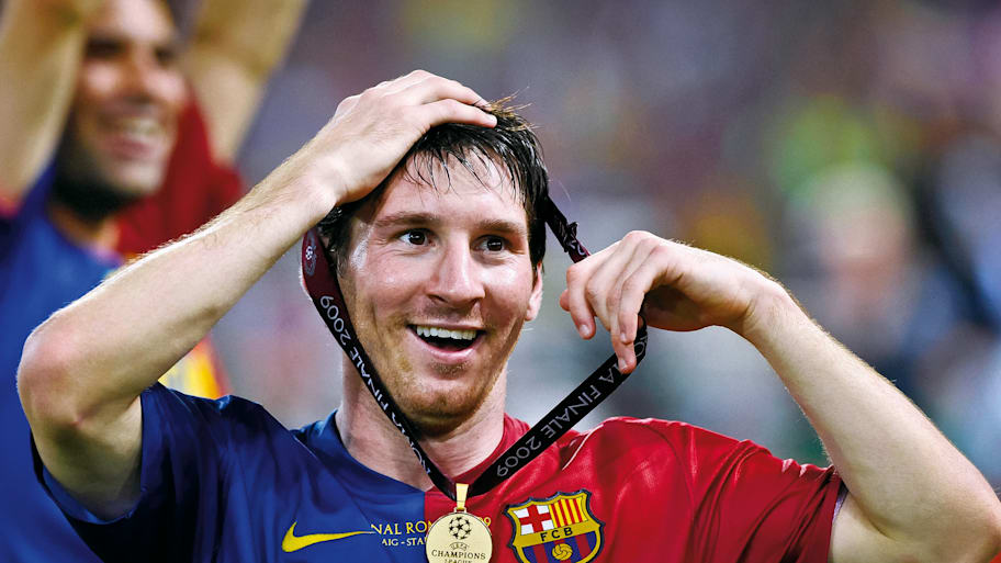 Lionel Messi with his Champions League winners’ medal from 2009.