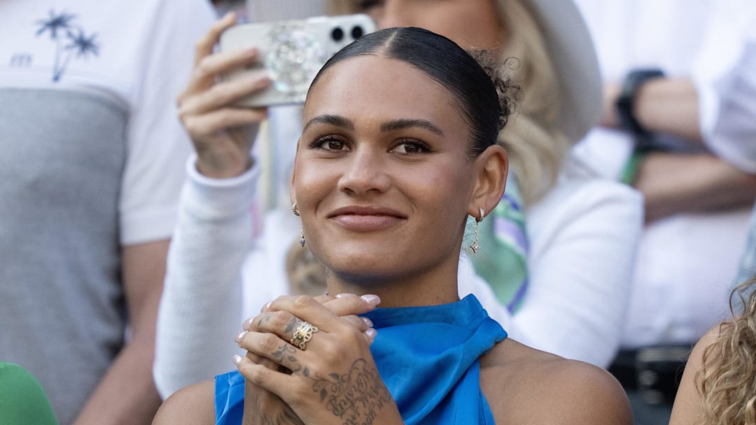 Jul 7, 2025; Wimbledon, United Kingdom; Trinity Rodman reacts to Ben Shelton of the United States winning his match against Lorenzo Sonego of Italy on day eight at All England Lawn Tennis and Croquet Club. 