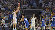 Mar 26, 2017; Memphis, TN, USA; Mar 26, 2017; Memphis, TN, USA; North Carolina Tar Heels forward Luke Maye (32) makes a basket with .3 seconds left over Kentucky Wildcats guard Isaiah Briscoe (13)  in the second half during the finals of the South Regional of the 2017 NCAA Tournament at FedExForum. North Carolina  won 75-73. Mandatory Credit: Justin Ford-Imagn Images
