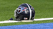 Nov 10, 2024; Inglewood, California, USA; A Tennessee Titans helmet on the turf during pregame warmups before an NFL game against the Los Angeles Chargers at SoFi Stadium. Mandatory Credit: Robert Hanashiro-Imagn Images