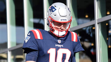 Nov 5, 2023; Foxborough, Massachusetts, USA; New England Patriots quarterback Mac Jones (10) walks to the field for pregame warmups prior to a game against the Washington Commanders at Gillette Stadium. Mandatory Credit: Bob DeChiara-Imagn Images