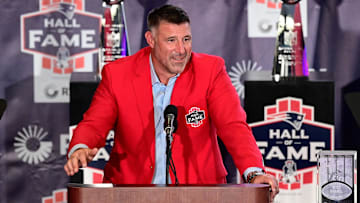 Oct 21, 2023; Foxborough, MA, USA; New England Patriots former line backer and current Tennessee Titans head coach Mike Vrabel makes a speech at his 2023 Patriots Hall of Fame induction in the Cross Insurance Pavilion at Gillette Stadium. Mandatory Credit: Eric Canha-Imagn Images