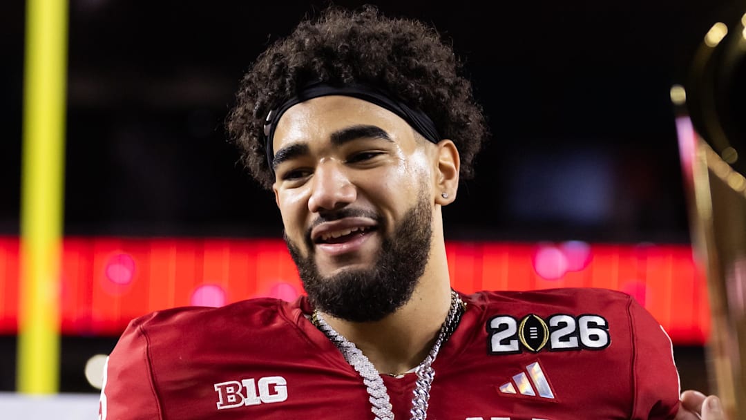 Jan 19, 2026; Miami Gardens, FL, USA; Indiana Hoosiers wide receiver Elijah Sarratt (13) celebrates after defeating the Miami Hurricanes in the College Football Playoff National Championship game at Hard Rock Stadium. Mandatory Credit: Mark J. Rebilas-Imagn Images
