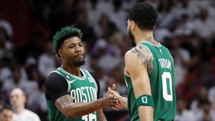 May 23, 2023; Miami, Florida, USA; Boston Celtics guard Marcus Smart (36) and forward Jayson Tatum (0) react in the third quarter against the Miami Heat during game four of the Eastern Conference Finals for the 2023 NBA playoffs at Kaseya Center.