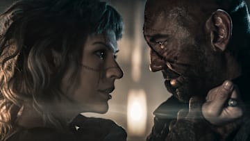 Gray Alys (Milla Jovovich) and Boyce (Dave Bautista) in In the Lost Lands. Image: Vertical.