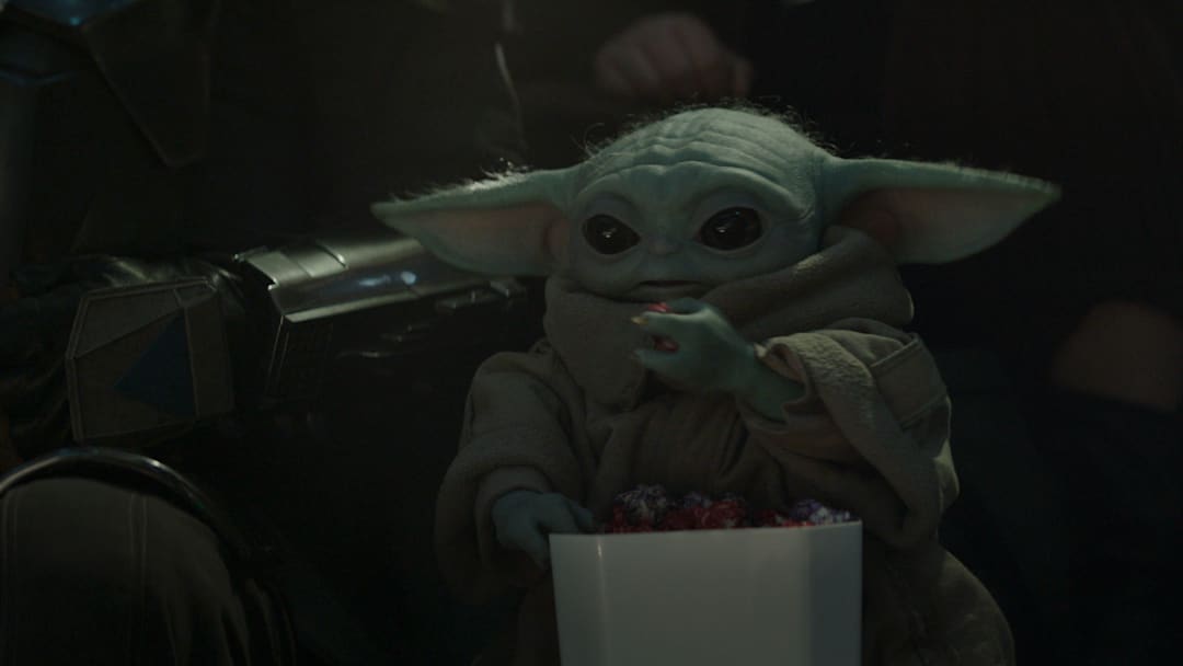 (L-R) Mandalorian (Pedro Pascal) and Grogu in Lucasfilm's THE MANDALORIAN & GROGU. Photo courtesy of Lucasfilm. © 2025 Lucasfilm Ltd™. All Rights Reserved.