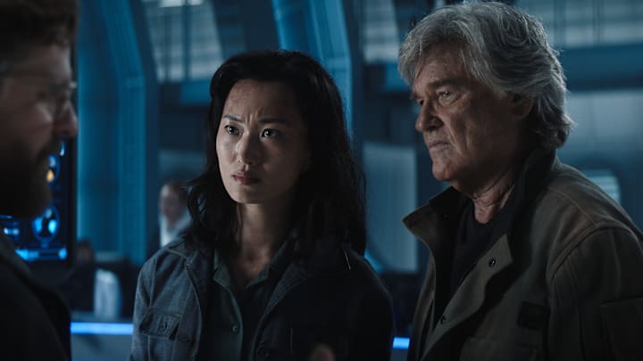 Joe Tippett, Mari Yamamoto and Kurt Russell in "Monarch: Legacy of Monsters," now streaming on Apple TV.