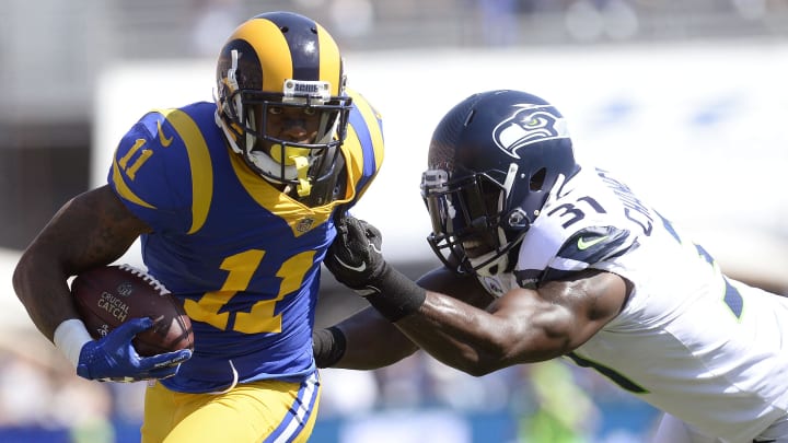 October 8, 2017; Los Angeles, CA, USA; Los Angeles Rams wide receiver Tavon Austin (11) moves the ball ahead of Seattle Seahawks Seattle Seahawks strong safety Kam Chancellor (31) during the first half at the Los Angeles Memorial Coliseum. 