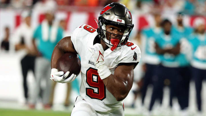 Aug 23, 2024; Tampa, Florida, USA;  Tampa Bay Buccaneers wide receiver Kameron Johnson (9) runs with the ball against the Miami Dolphins during the second quarter at Raymond James Stadium. Mandatory Credit: Kim Klement Neitzel-USA TODAY Sports